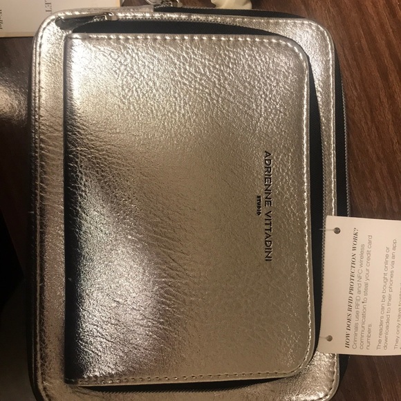 Adrienne Vittadini Accessories - Charging wallet. Silver.